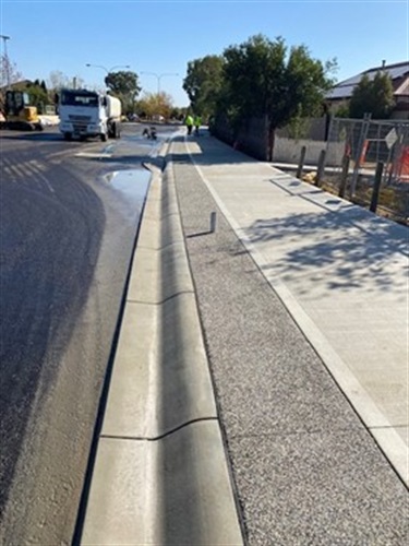 Image showing new curb and channel, drainage, pedestrian paths and asphalting 4