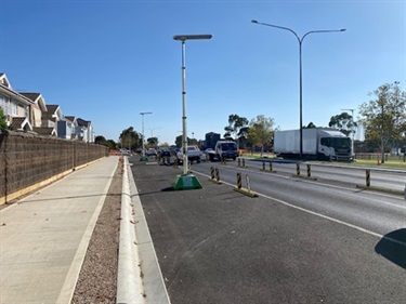 Image showing new curb and channel, drainage, pedestrian paths and asphalting 1